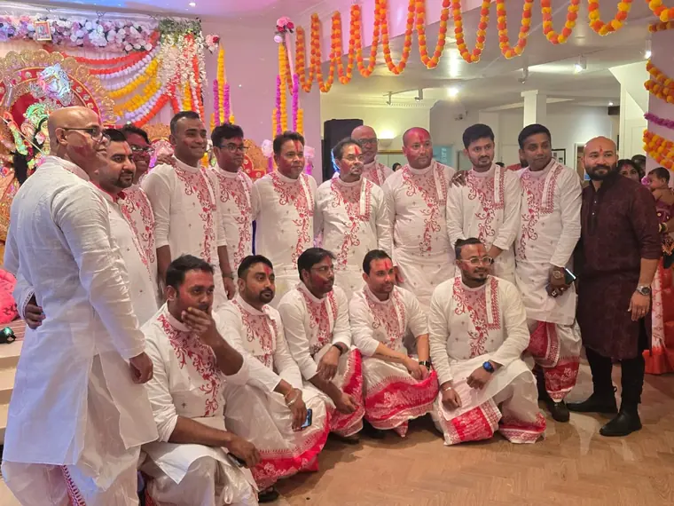 Red and white panjabis for Dashami